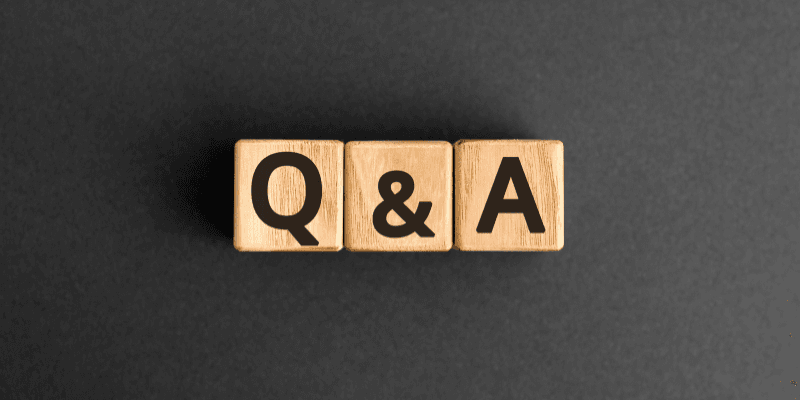 Q&A letters on wood with black background